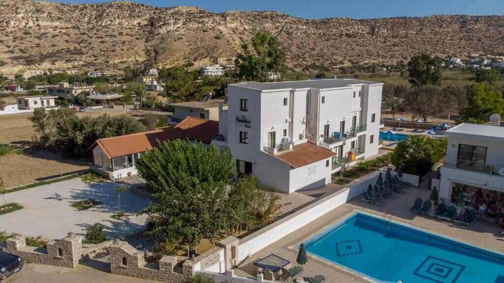 Paradise Matala Hotel, its garden and pool seen from above